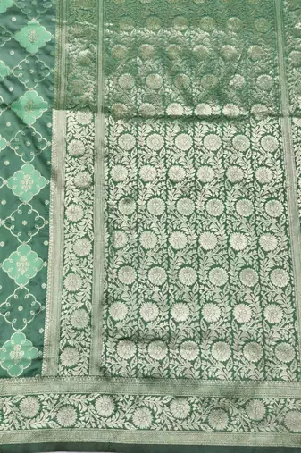 Sea green zari woven silk blend saree with blouse piece