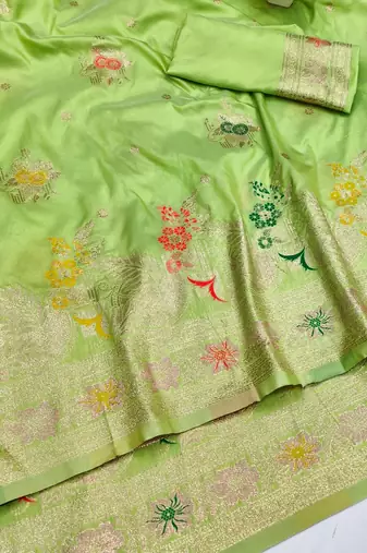 Light green zari woven silk blend saree with blouse piece
