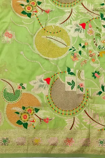 Light green zari woven silk blend saree with blouse piece