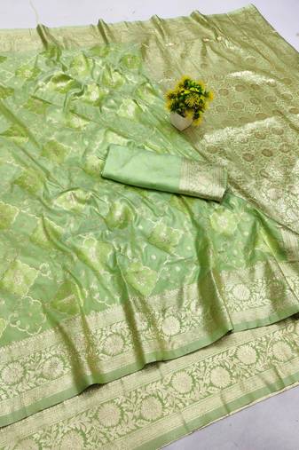 Green zari woven banarasi silk blend saree with blouse piece