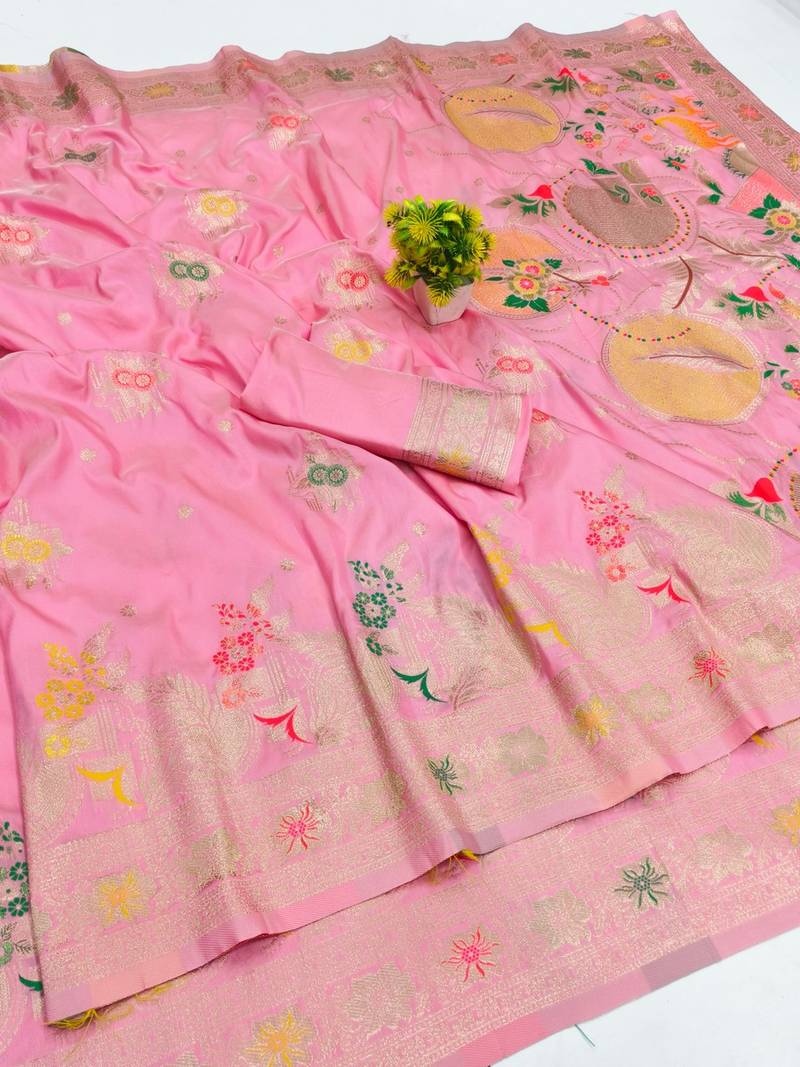 Pink zari woven banarasi silk blend saree with blouse piece
