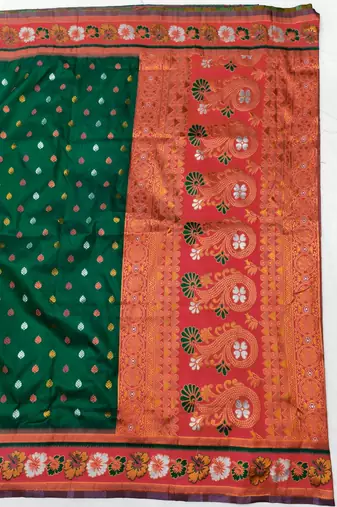 Green zari woven silk blend saree with blouse piece
