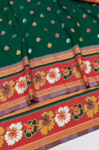 Green zari woven silk blend saree with blouse piece