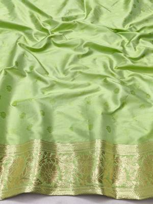 Green zari woven silk blend saree with blouse piece 4