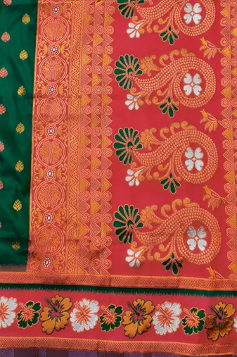 Green zari woven silk blend saree with blouse piece