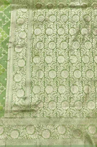 Green zari woven silk blend saree with blouse piece
