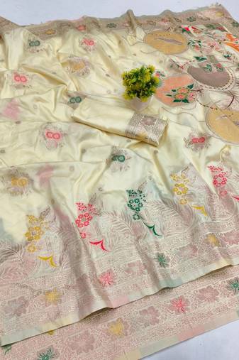 Cream zari woven banarasi silk blend saree with blouse piece