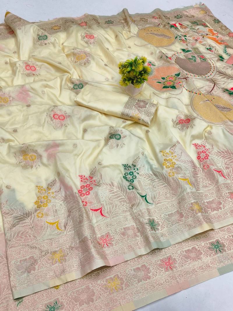 Cream zari woven banarasi silk blend saree with blouse piece