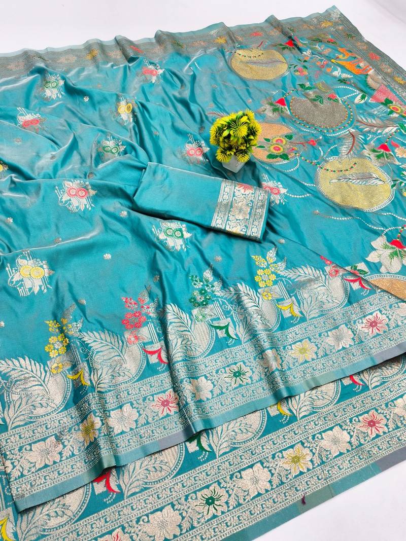Light blue zari woven banarasi silk blend saree with blouse piece