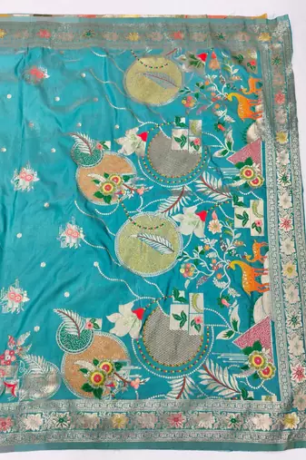 Light blue zari woven banarasi silk blend saree with blouse piece
