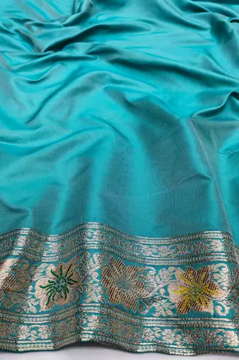 Light blue zari woven banarasi silk blend saree with blouse piece