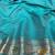 Light blue zari woven banarasi silk blend saree with blouse piece