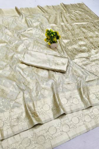 Cream zari woven silk blend saree with blouse piece