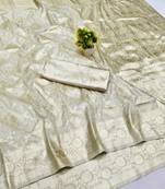 Cream zari woven banarasi silk blend saree with blouse piece
