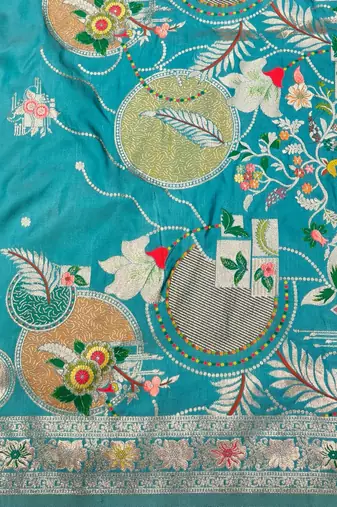 Light blue zari woven banarasi silk blend saree with blouse piece