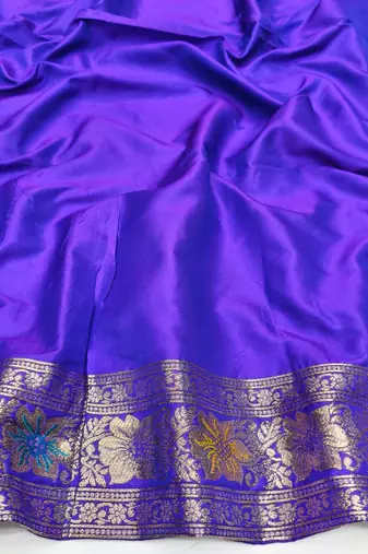 Purple zari woven silk blend saree with blouse piece