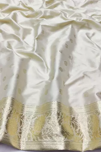 Cream zari woven silk blend saree with blouse piece
