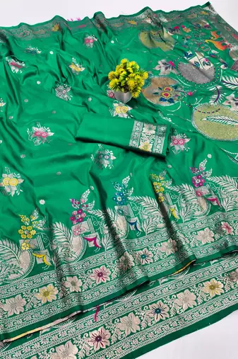 Green zari woven banarasi silk blend saree with blouse piece