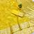 Yellow zari woven banarasi silk blend saree with blouse piece