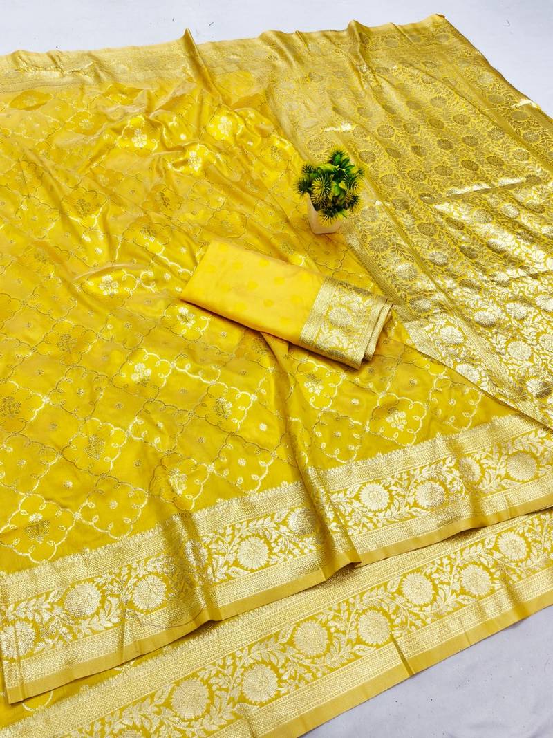 Yellow zari woven banarasi silk blend saree with blouse piece