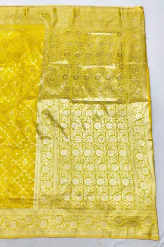 Yellow zari woven silk blend saree with blouse piece