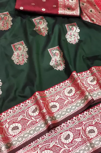 Green zari woven silk blend saree with blouse piece