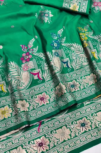 Green zari woven silk blend saree with blouse piece