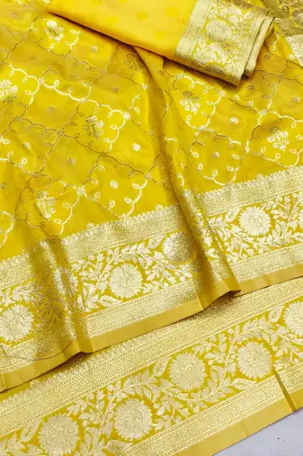 Yellow zari woven silk blend saree with blouse piece