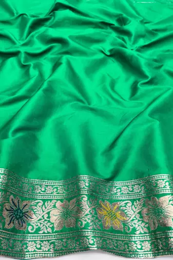 Green zari woven silk blend saree with blouse piece