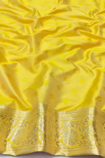Yellow zari woven silk blend saree with blouse piece