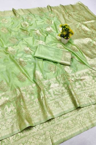 Light green zari woven banarasi silk blend saree with blouse piece