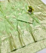 Light green zari woven banarasi silk blend saree with blouse piece