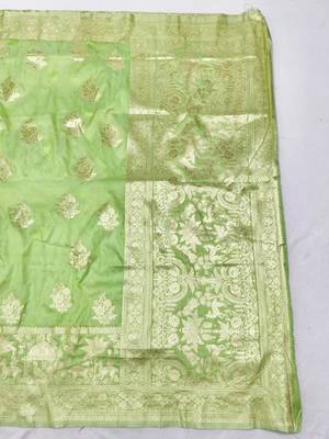 Light green zari woven silk blend saree with blouse piece 2