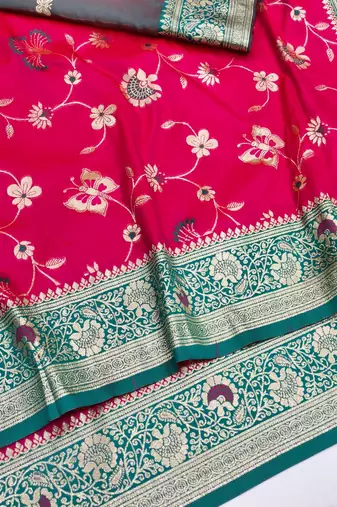 Rani pink zari woven silk blend saree with blouse piece