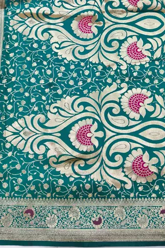 Rani pink zari woven silk blend saree with blouse piece