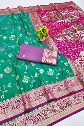 Green zari woven banarasi silk blend saree with blouse piece