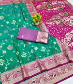 Green zari woven banarasi silk blend saree with blouse piece