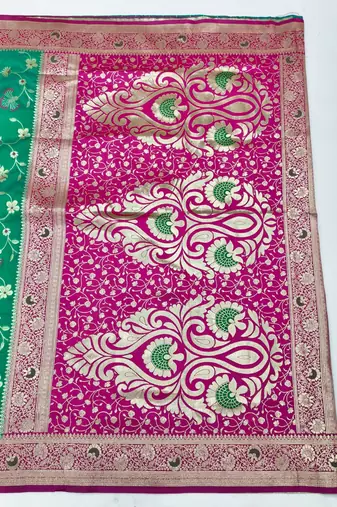 Green zari woven silk blend saree with blouse piece