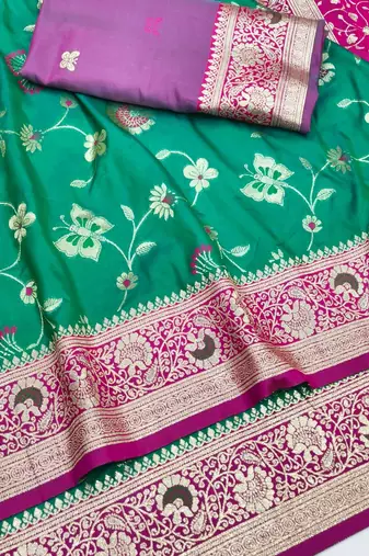 Green zari woven silk blend saree with blouse piece