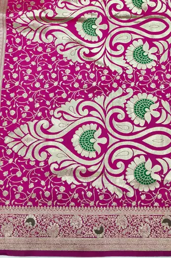 Green zari woven silk blend saree with blouse piece