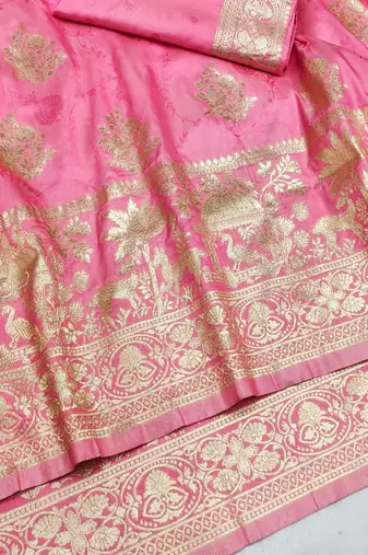 Pink zari woven silk blend saree with blouse piece