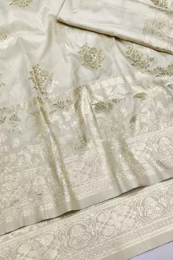 Cream zari woven silk blend saree with blouse piece