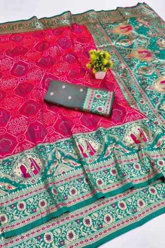 Pink zari woven banarasi silk blend saree with blouse piece