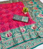 Pink zari woven banarasi silk blend saree with blouse piece