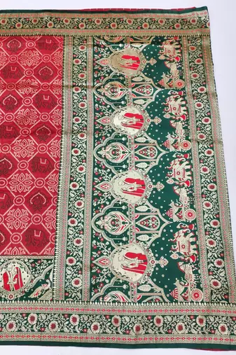 Red zari woven banarasi silk blend saree with blouse piece