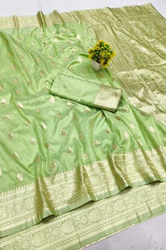 Light green zari woven banarasi silk blend saree with blouse piece
