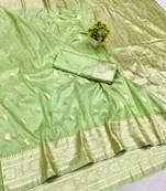 Light green zari woven banarasi silk blend saree with blouse piece