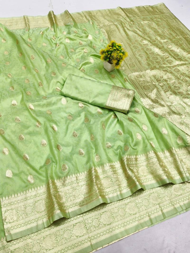 Light green zari woven banarasi silk blend saree with blouse piece