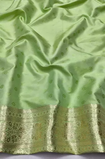 Light green zari woven silk blend saree with blouse piece