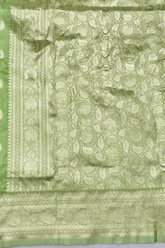 Light green zari woven silk blend saree with blouse piece